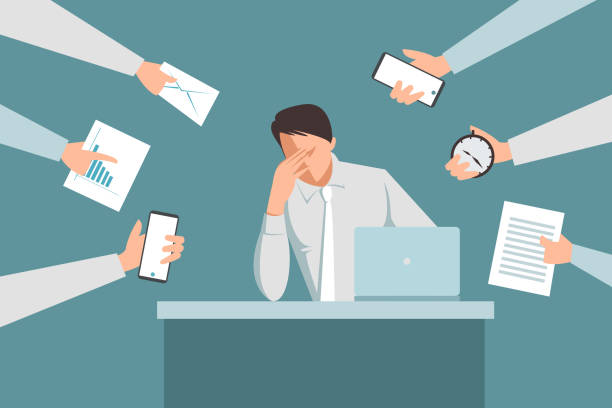 Illustration of a stressed office worker at a laptop, surrounded by hands pushing papers, phones and a clock