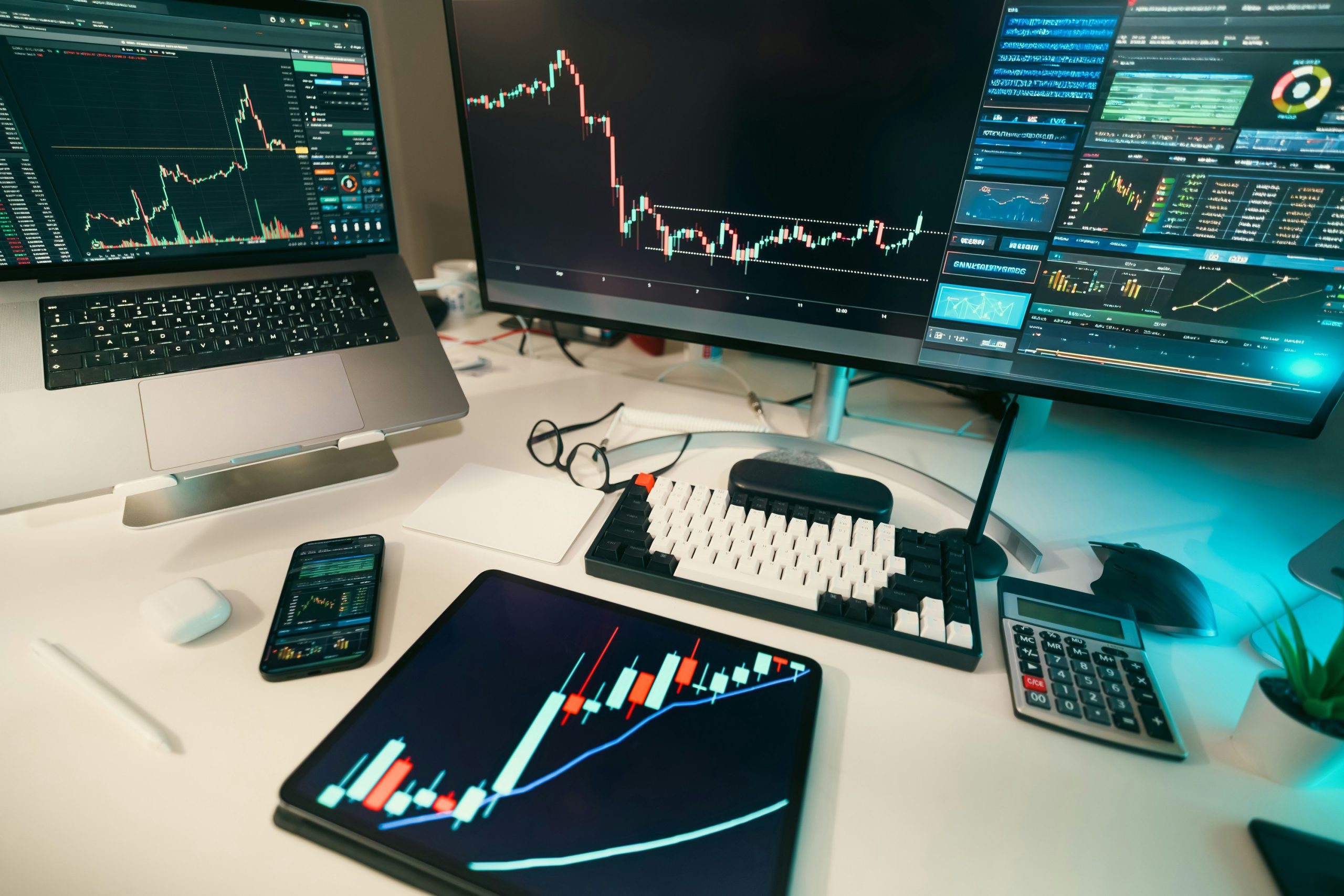 Optimal Trading Tools A professional trading desk with multiple screens displaying real-time market data and order execution platforms, highlighting the importance of optimal trading conditions.